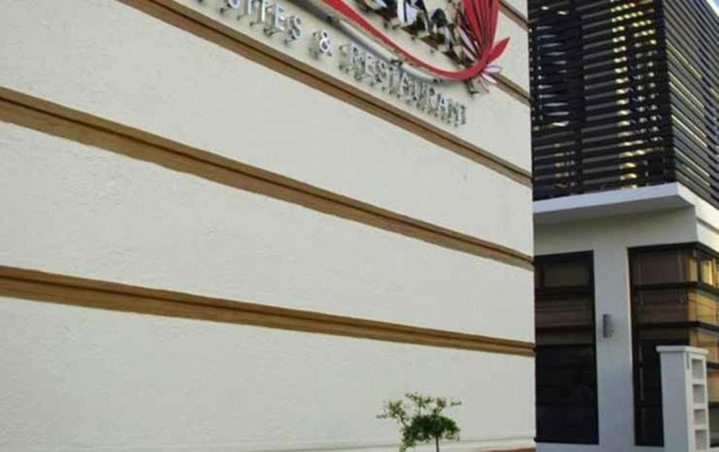 The Red Palm Suites And Restaurant Butuan City Extérieur photo